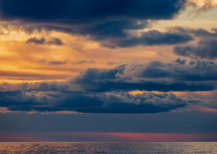 Photos of over sea cloud at sunset