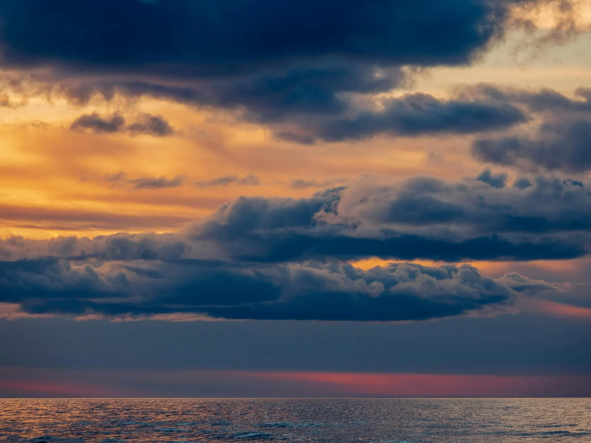 Photos of over sea cloud at sunset